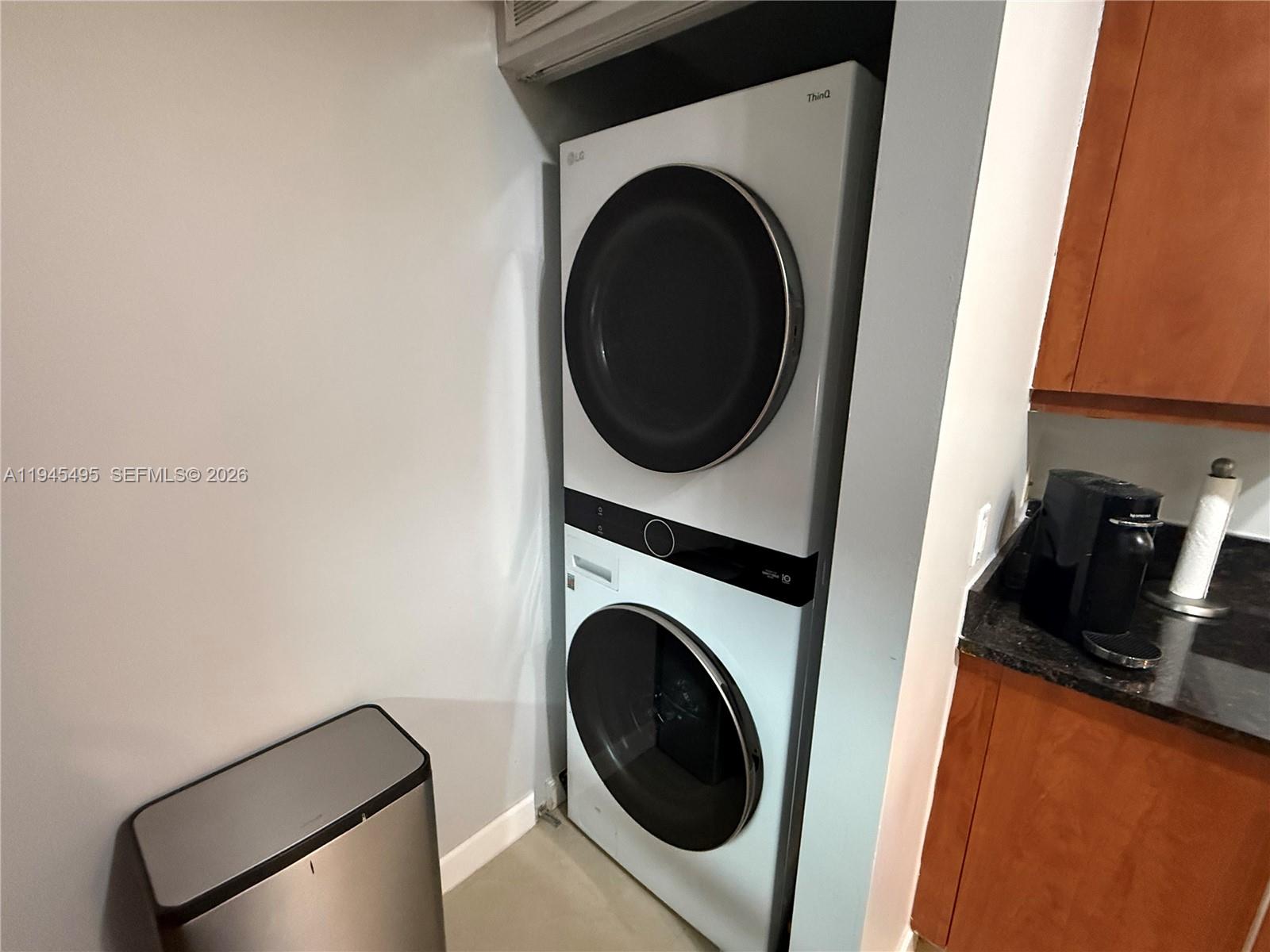 7350 Southwest 89th Street, Unit 1908S Miami, FL 33156 - Photo 15 of 28 a utility room with dryer and washer