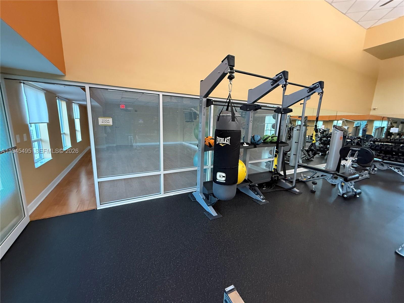 7350 Southwest 89th Street, Unit 1908S Miami, FL 33156 - Photo 19 of 28 a view of a room with gym equipment
