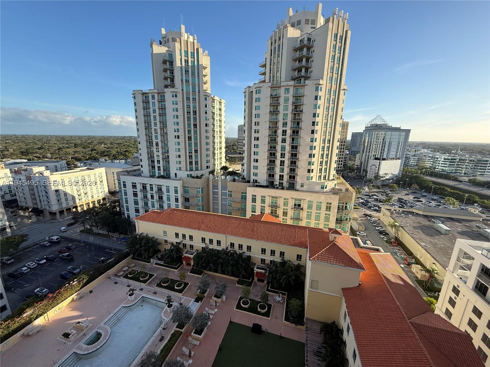 7350 Southwest 89th Street, Unit 1908S Miami, FL 33156 - Photo 2 of 28 a view of a city with tall buildings