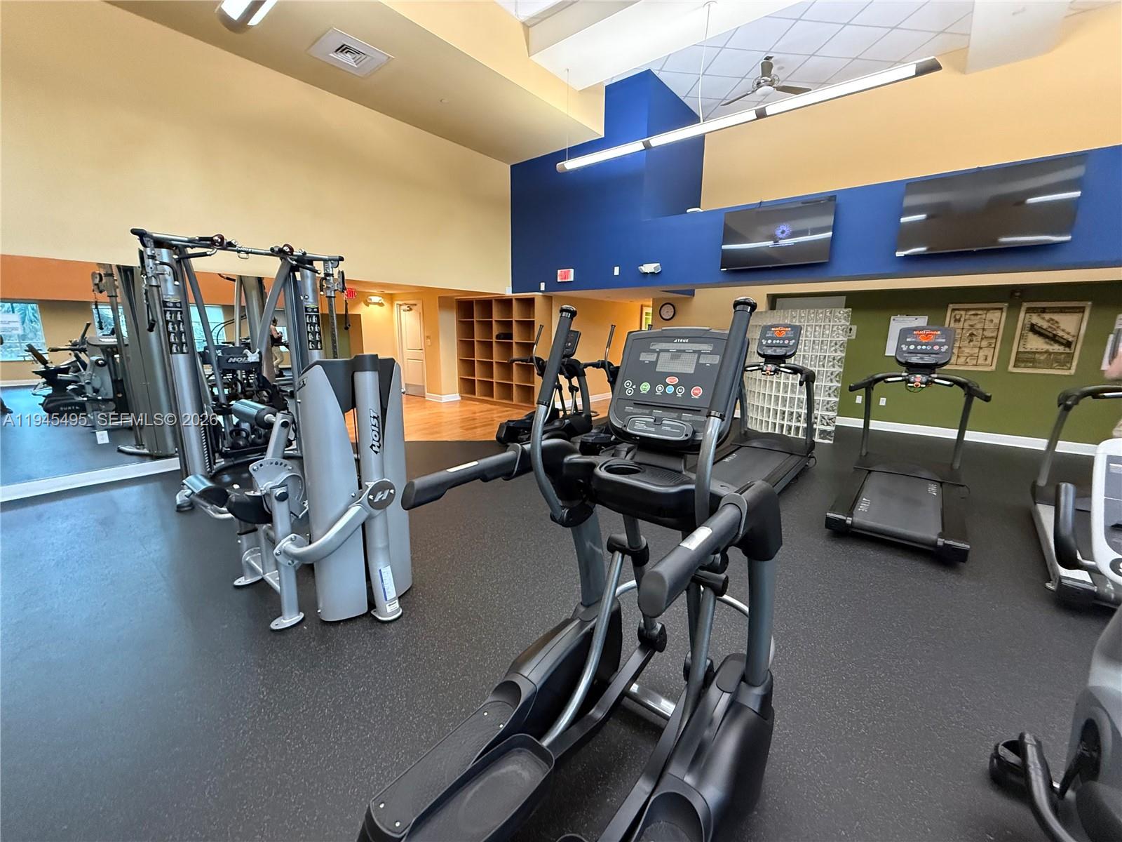 7350 Southwest 89th Street, Unit 1908S Miami, FL 33156 - Photo 21 of 28 a view of a room with gym equipment