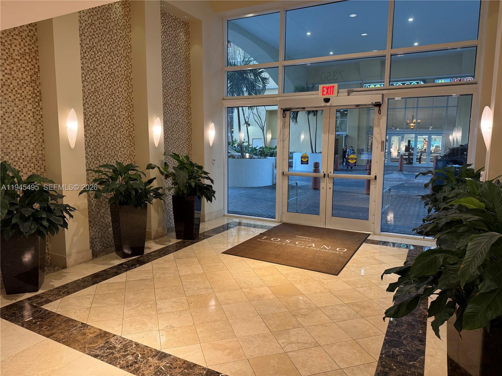 7350 Southwest 89th Street, Unit 1908S Miami, FL 33156 - Photo 24 of 28 a view of a entryway door with living room