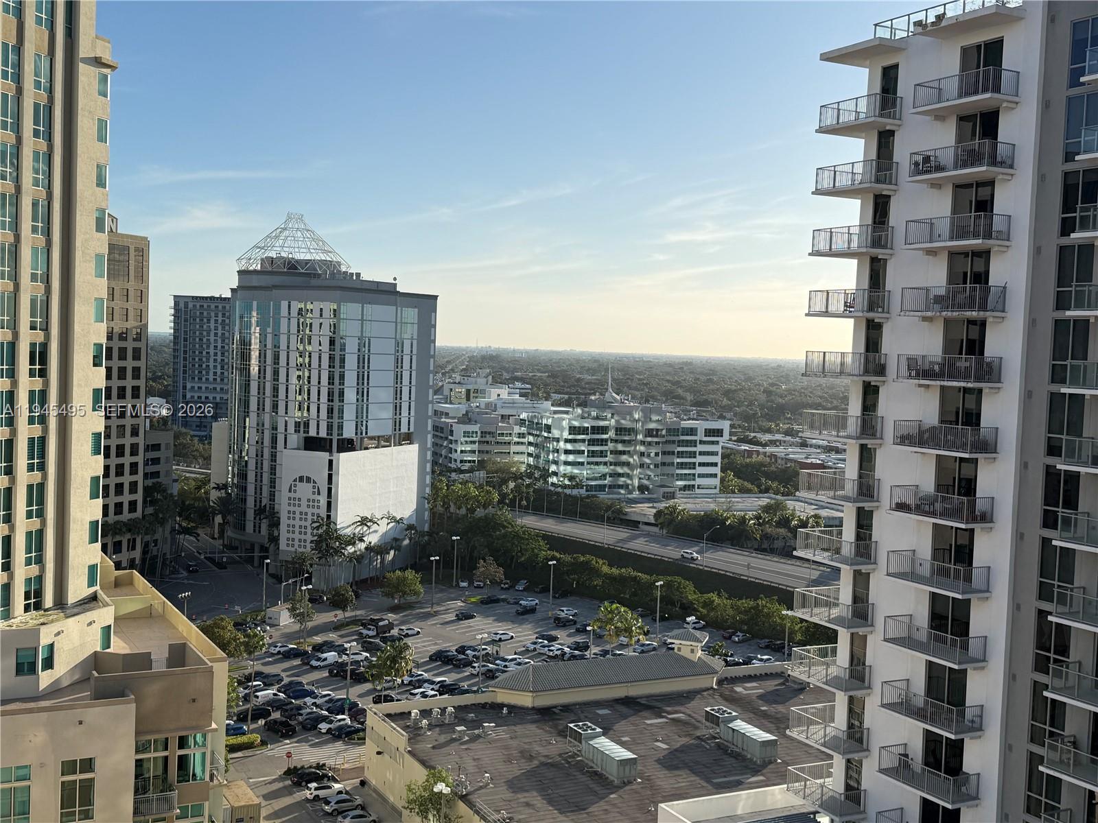 7350 Southwest 89th Street, Unit 1908S Miami, FL 33156 - Photo 3 of 28 a view of a city with tall buildings