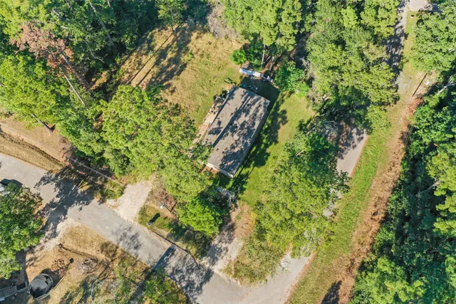 a view of an outdoor space with a tree