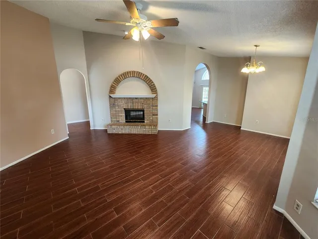 a view of a livingroom with wooden floor