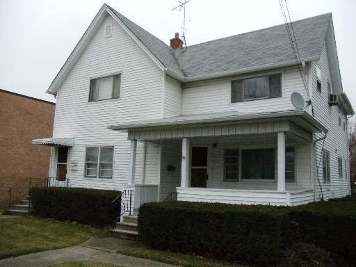 1425 Main Street Crete, IL 60417 - Photo 1 of 1 a front view of a house with a yard