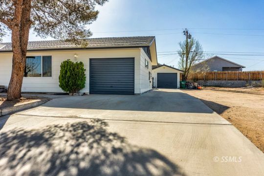 1521 South McCall Street Ridgecrest, CA 93555 - Photo 2 of 39 a view of a house with a yard
