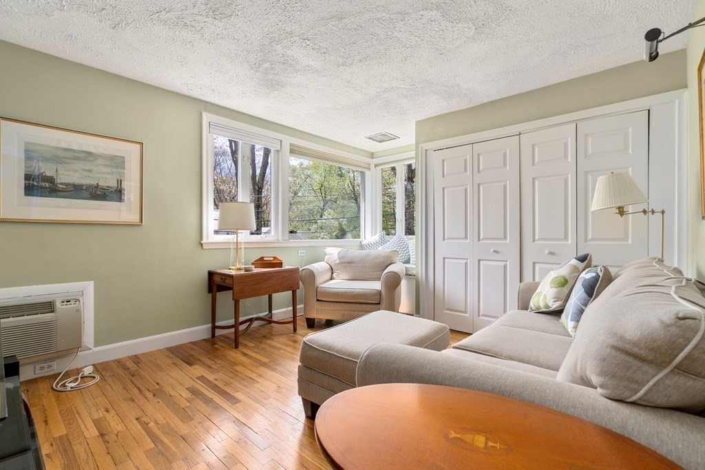 73 Beverly Road Chestnut Hill, MA 02467 - Photo 12 of 21 a living room with furniture and a window