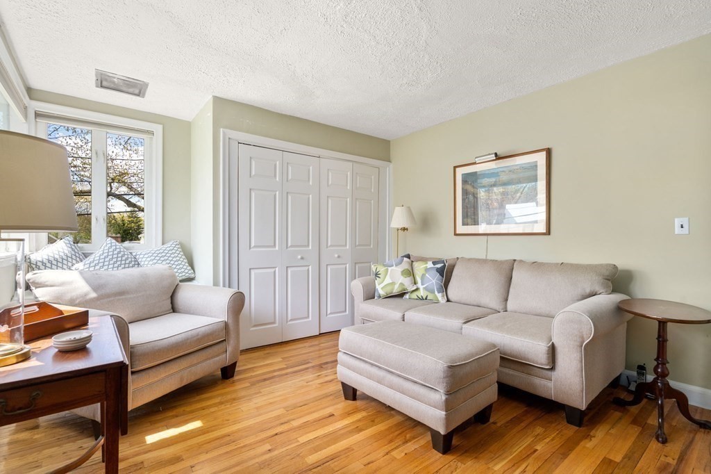 73 Beverly Road Chestnut Hill, MA 02467 - Photo 13 of 21 a living room with furniture and a couch