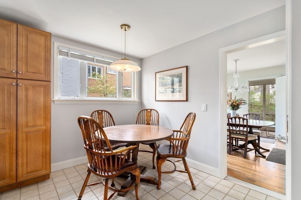 73 Beverly Road Chestnut Hill, MA 02467 - Photo 8 of 21 a dining room with furniture and window