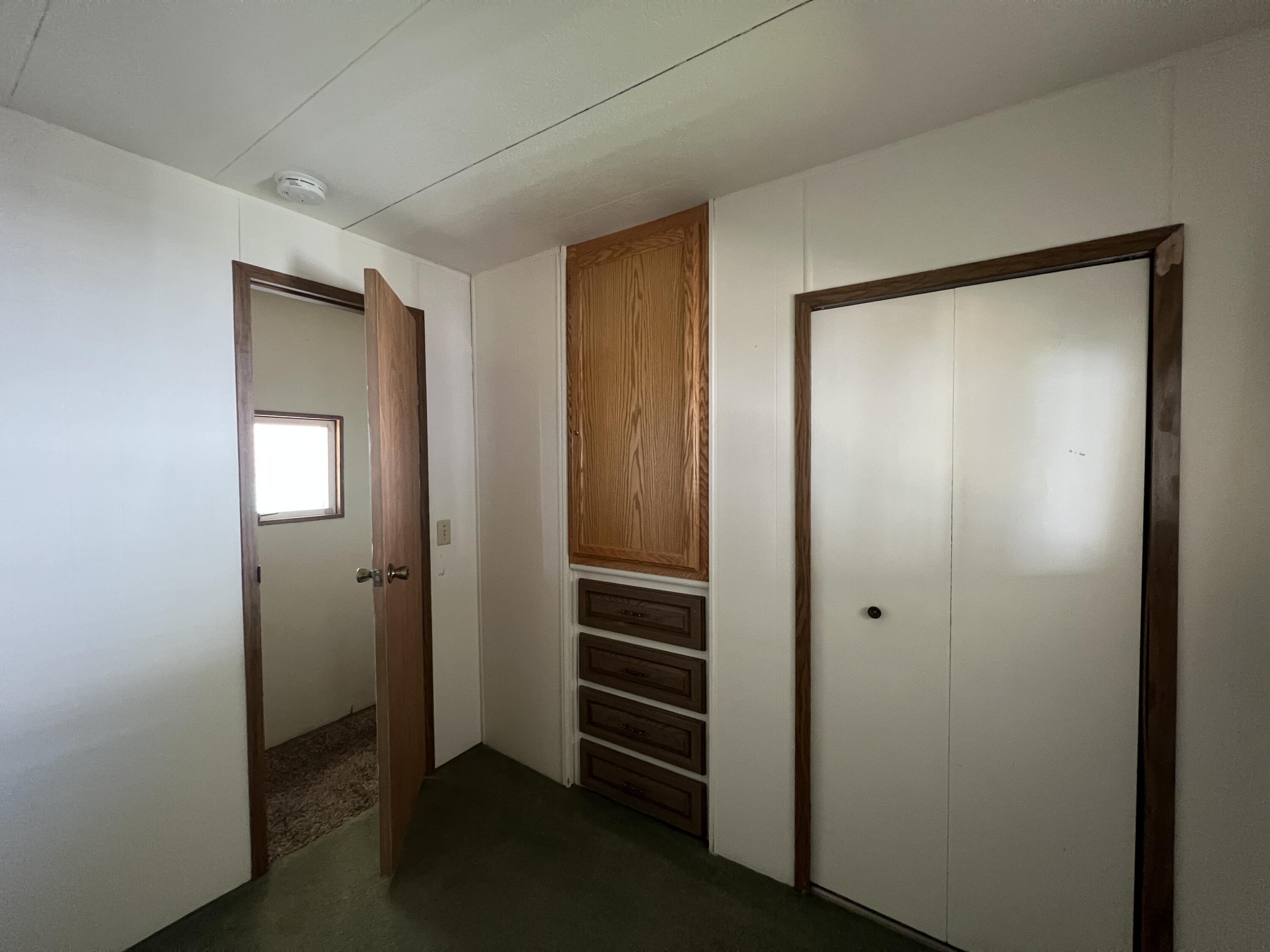 481 Twin View Boulevard, Unit 35 Redding, CA 96003 - Photo 6 of 17 a view of walk in closet with empty racks