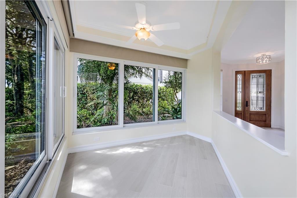 217 Colonade Circle Naples, FL 34103 - Photo 20 of 40 a view of an empty room with a window