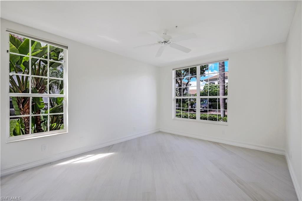 217 Colonade Circle Naples, FL 34103 - Photo 27 of 40 a view of an empty room with a window