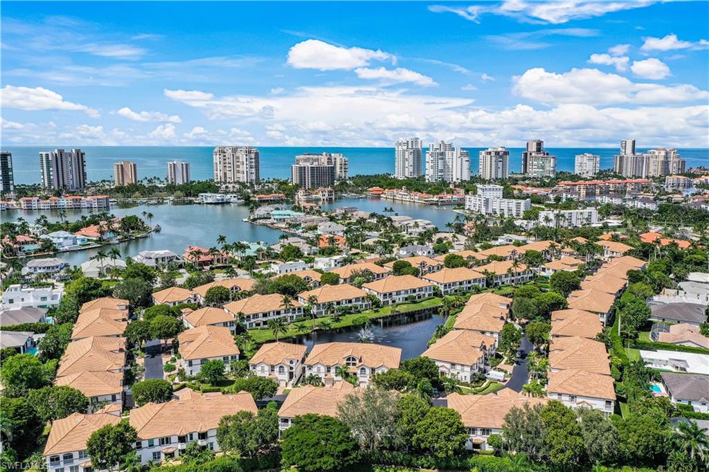 217 Colonade Circle Naples, FL 34103 - Photo 39 of 40 an aerial view of residential houses with city view