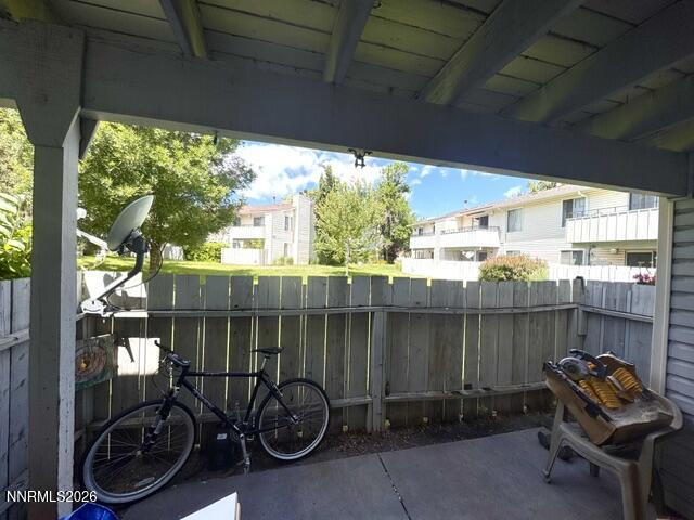 1557 Delucchi Lane, Unit G Reno, NV 89502 - Photo 7 of 8 a view of a two chairs in the roof deck