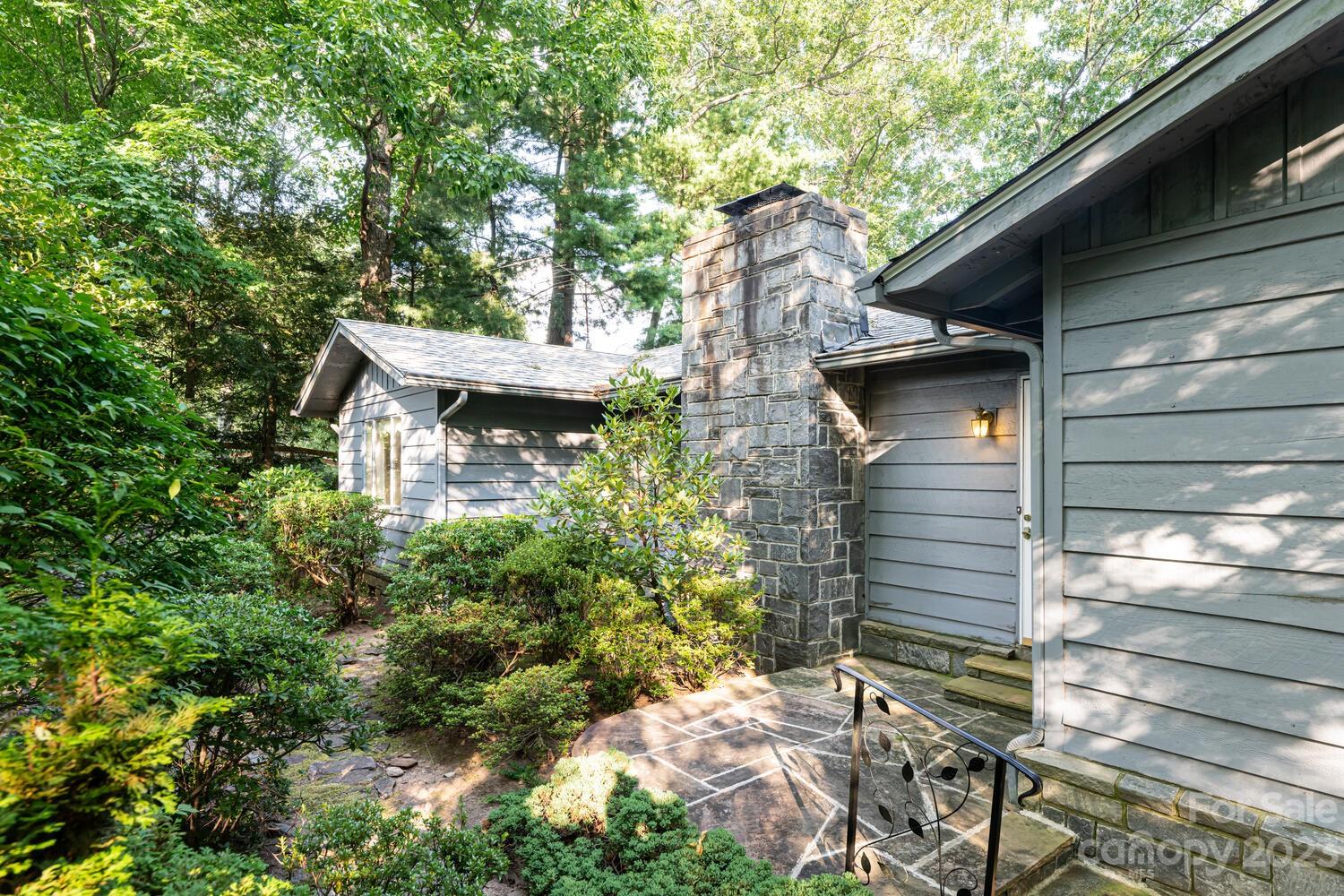 1715 Hogback Mountain Road Tryon, NC 28782 - Photo 6 of 44 a backyard of a house with lots of green space