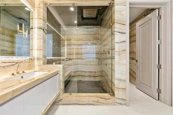 a view of a chairs and table in patio