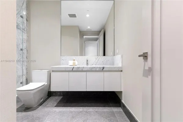 a very nice looking room with a mirror