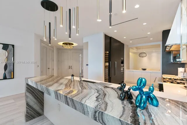 a spacious bedroom with a bed and a night stand