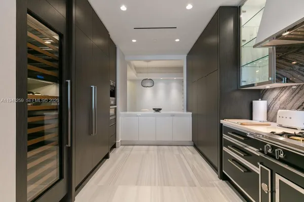 a bedroom with a bed and a mirror