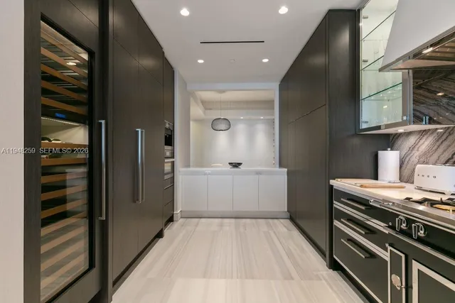 a bedroom with a bed and a mirror