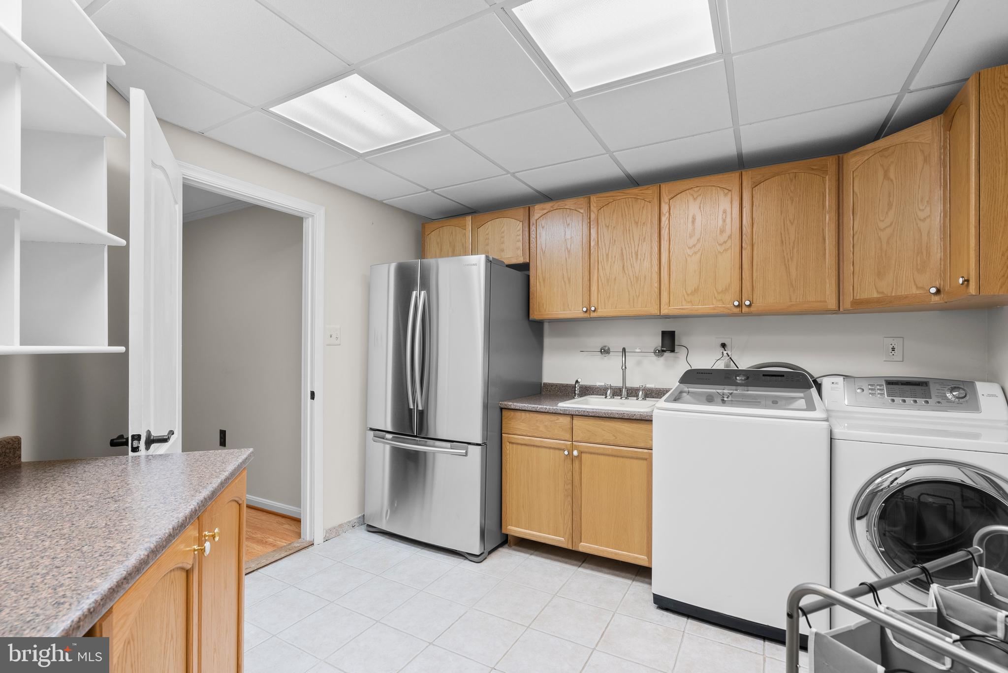 15425 Conrad Spring Road Boyds, MD 20841 - Photo 36 of 58 Spacious lower level laundry room
