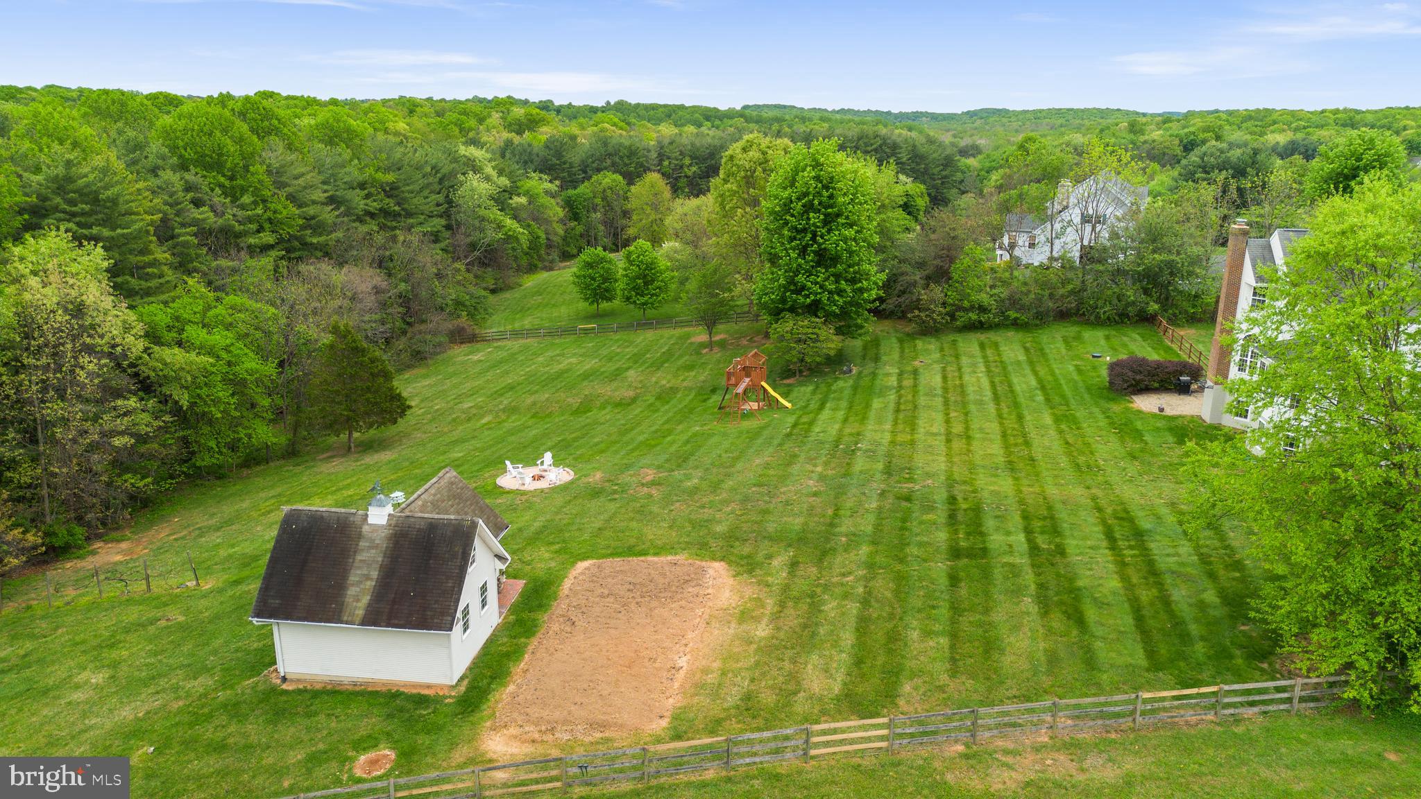 15425 Conrad Spring Road Boyds, MD 20841 - Photo 39 of 58 Backyard shed with a dedicated garden area