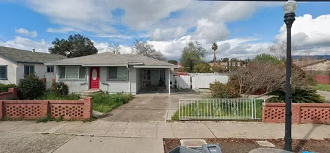 a house with a garden in front of it