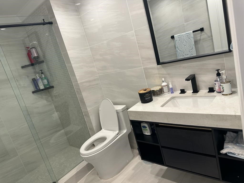 1690 Stoddard Avenue Thousand Oaks, CA 91360 - Photo 12 of 17 a bathroom with a sink and a mirror