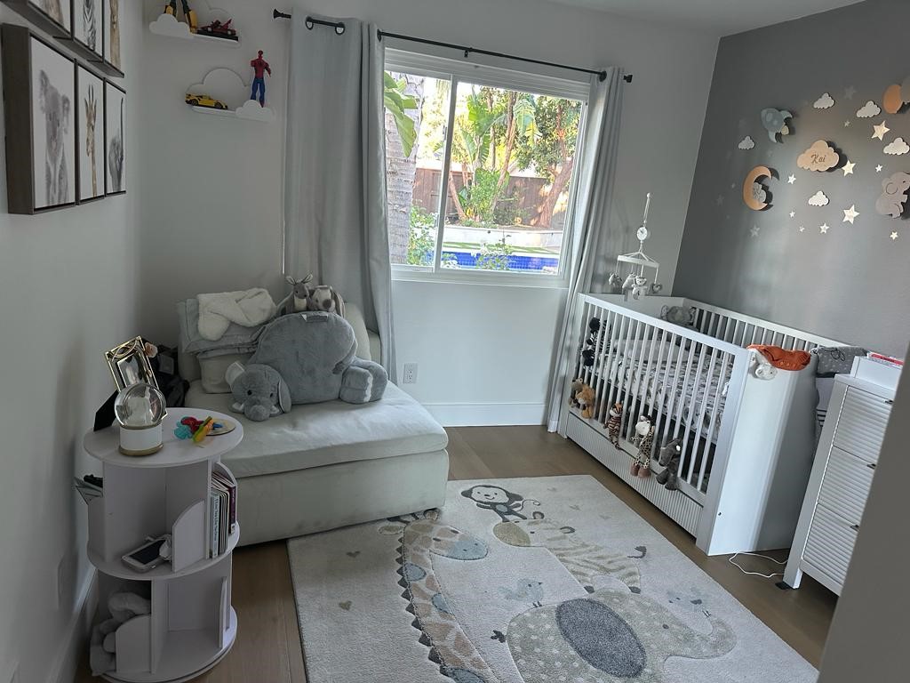1690 Stoddard Avenue Thousand Oaks, CA 91360 - Photo 13 of 17 a bedroom with furniture and a window