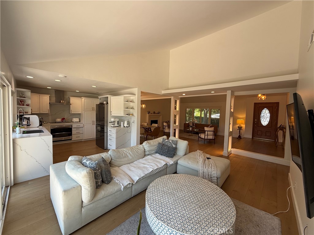 1690 Stoddard Avenue Thousand Oaks, CA 91360 - Photo 6 of 17 a living room with furniture and a large window