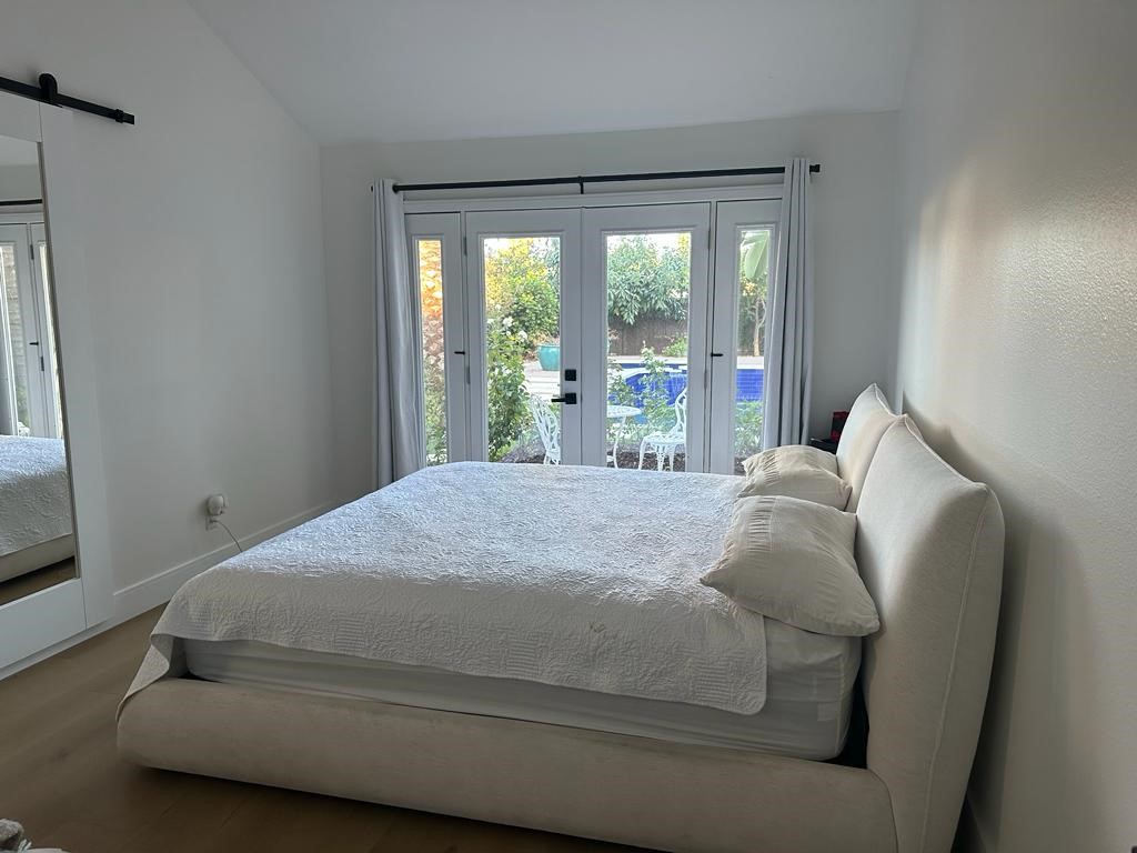 1690 Stoddard Avenue Thousand Oaks, CA 91360 - Photo 9 of 17 a bed sitting in a bedroom next to a window