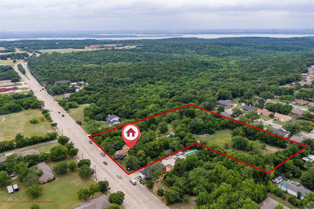 1007 West Belt Line Road Cedar Hill, TX 75104 - Photo 1 of 30 Expansive land parcel with significant tree coverage and clear boundaries, featuring road frontage and proximity to established neighborhoods