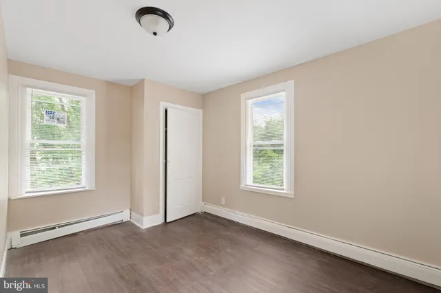 an empty room with windows