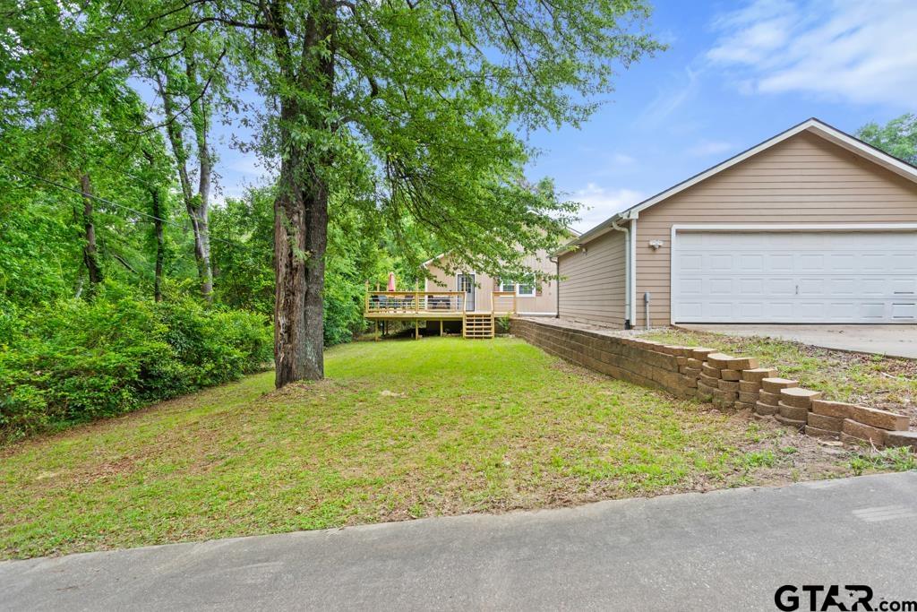 448 North Hill Road Tyler, TX 75706 - Photo 26 of 30 a view of backyard of house with green space