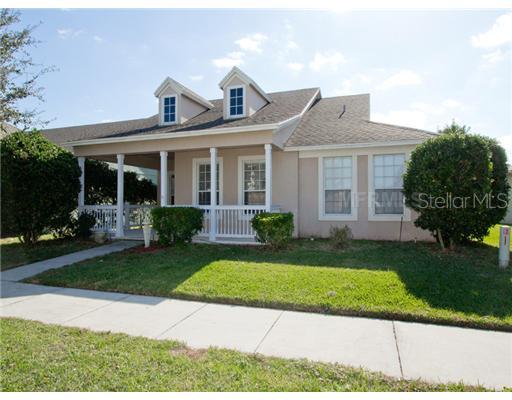12960 Freeman Street Windermere, FL 34786 - Photo 1 of 1 a front view of a house with a garden