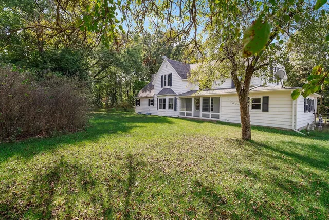 a house with garden in front of it