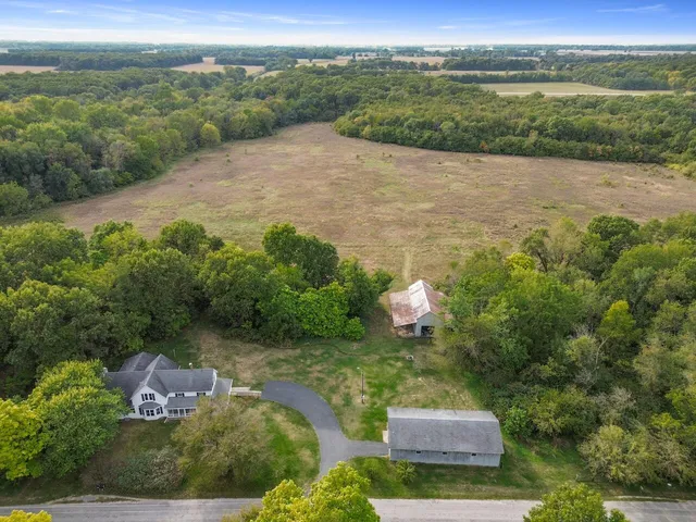 a view of a lake with a yard