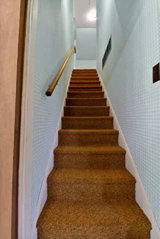 a view of a room with a wardrobe space