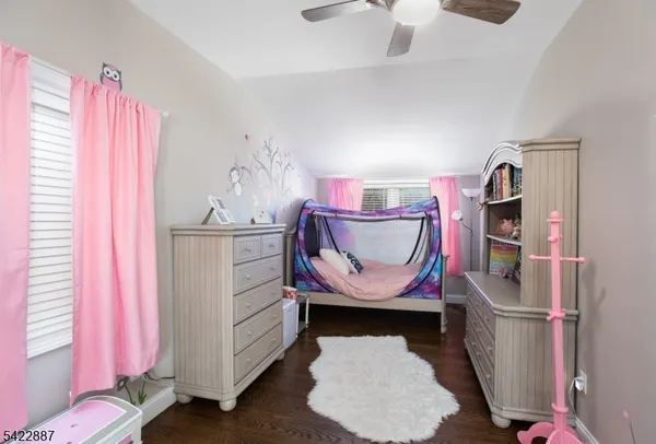 a room with furniture and a window