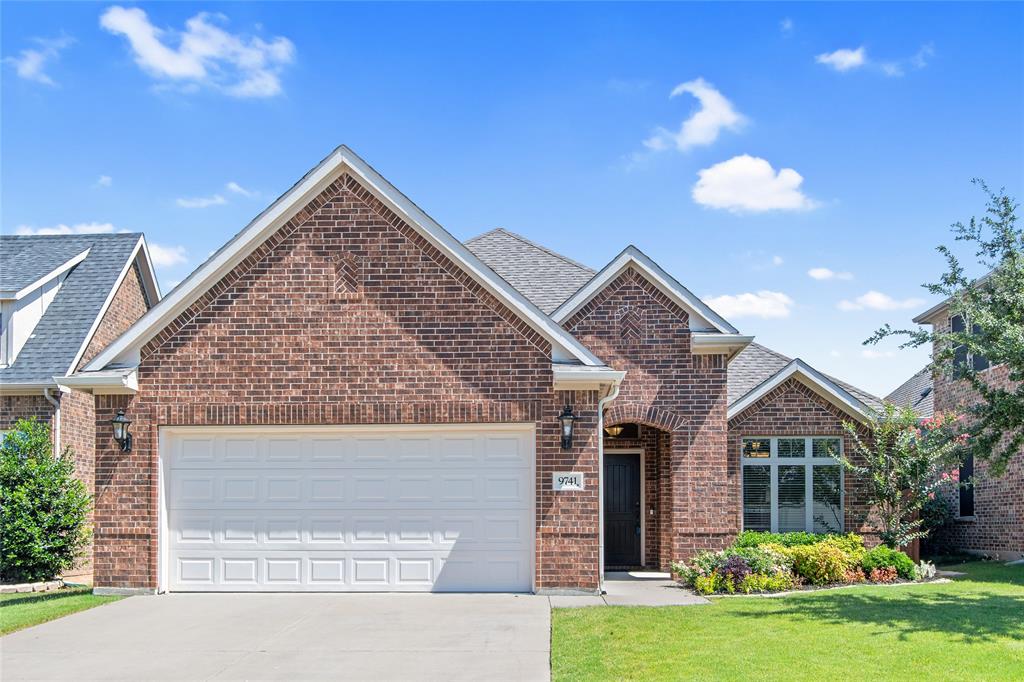 9741 Rio Frio Trail Fort Worth, TX 76126 - Photo 1 of 1 a front view of house with yard and green space