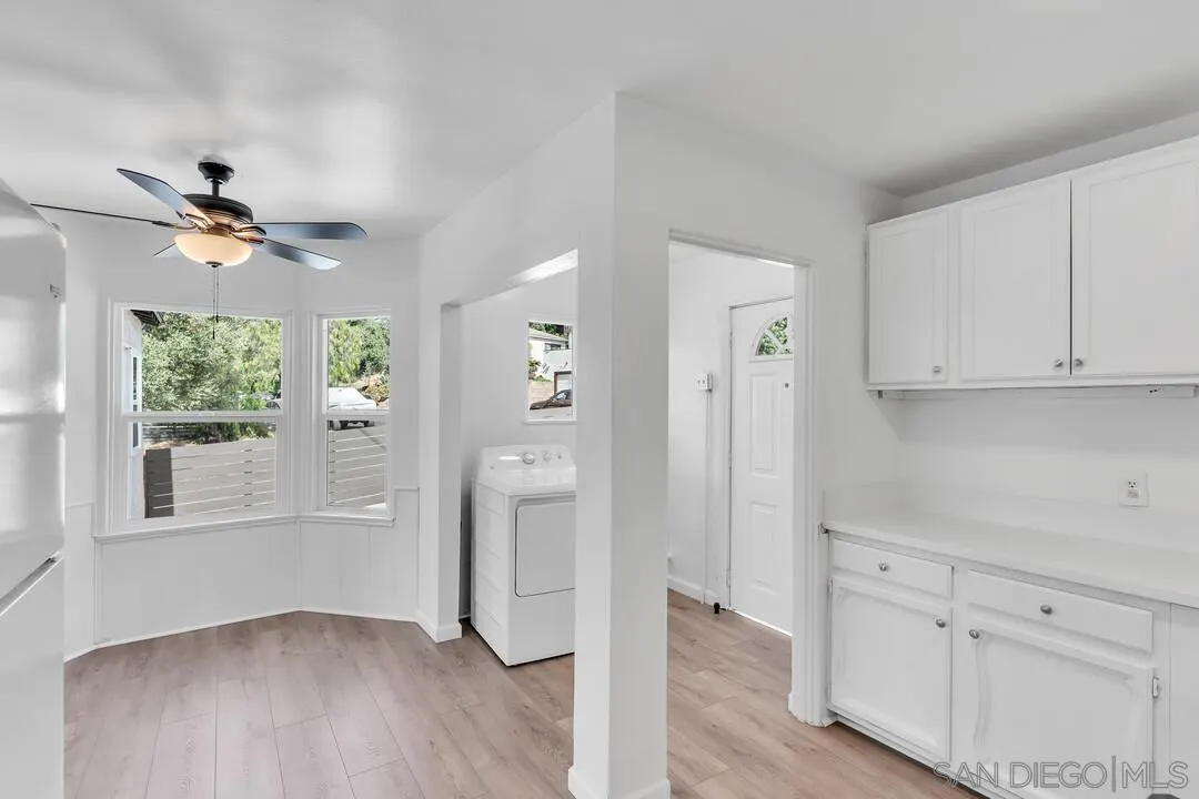 7901 Hillside Drive La Mesa, CA 91942 - Photo 18 of 52 wooden floor in an empty room with a window