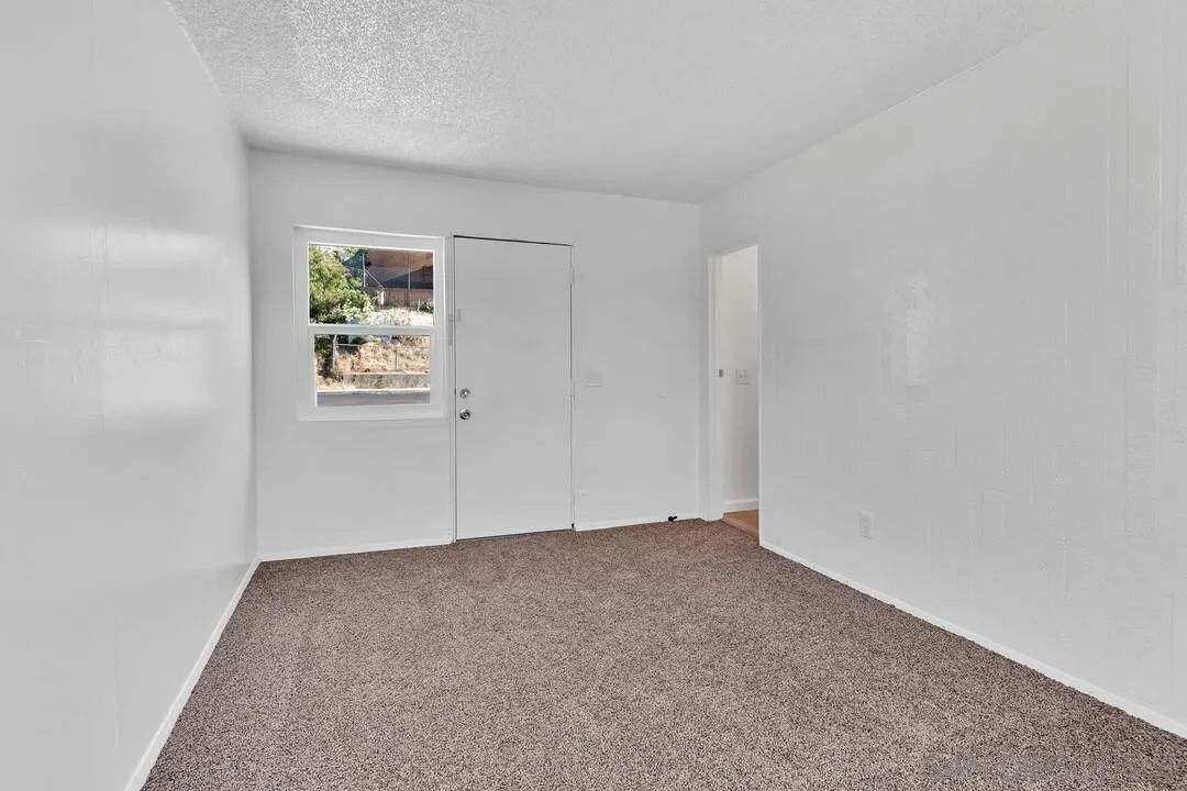 7901 Hillside Drive La Mesa, CA 91942 - Photo 33 of 52 an empty room with windows