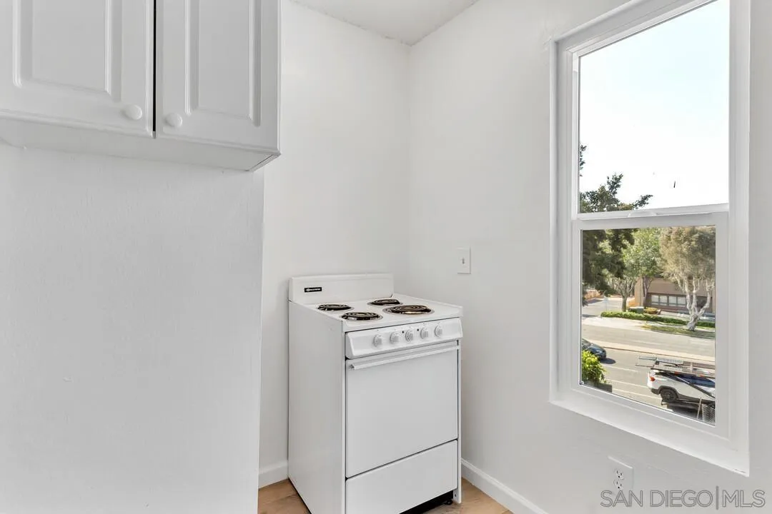 7901 Hillside Drive La Mesa, CA 91942 - Photo 37 of 52 a kitchen with a stove and a window