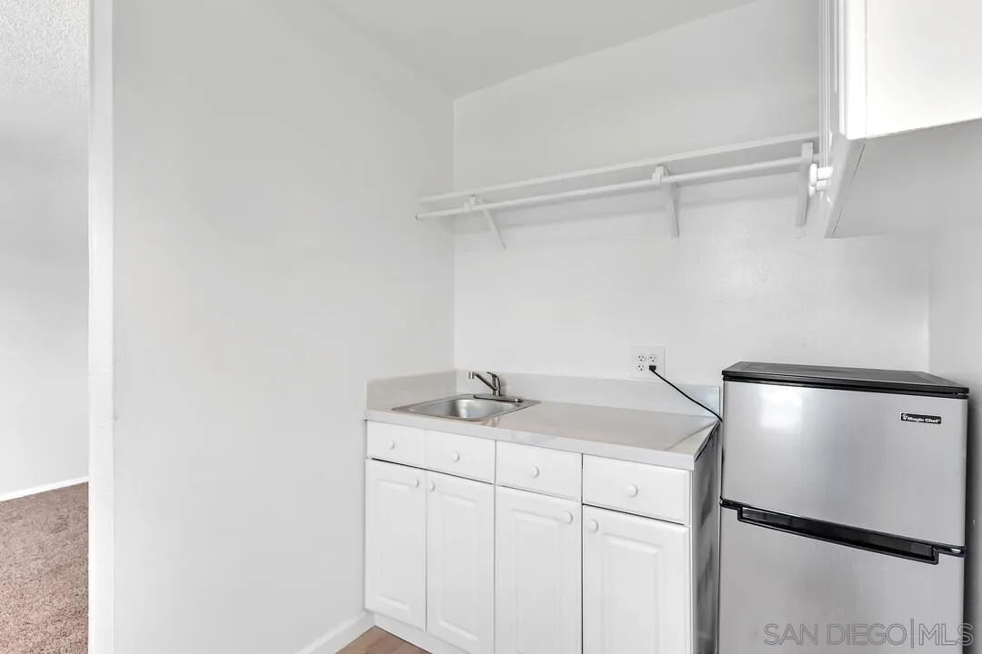 7901 Hillside Drive La Mesa, CA 91942 - Photo 38 of 52 a room with a sink and a refrigerator