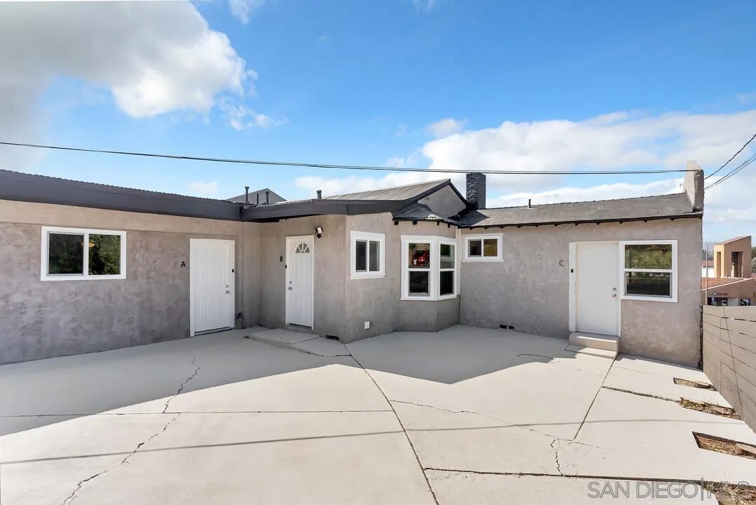 7901 Hillside Drive La Mesa, CA 91942 - Photo 5 of 52 a front view of a house with a garage