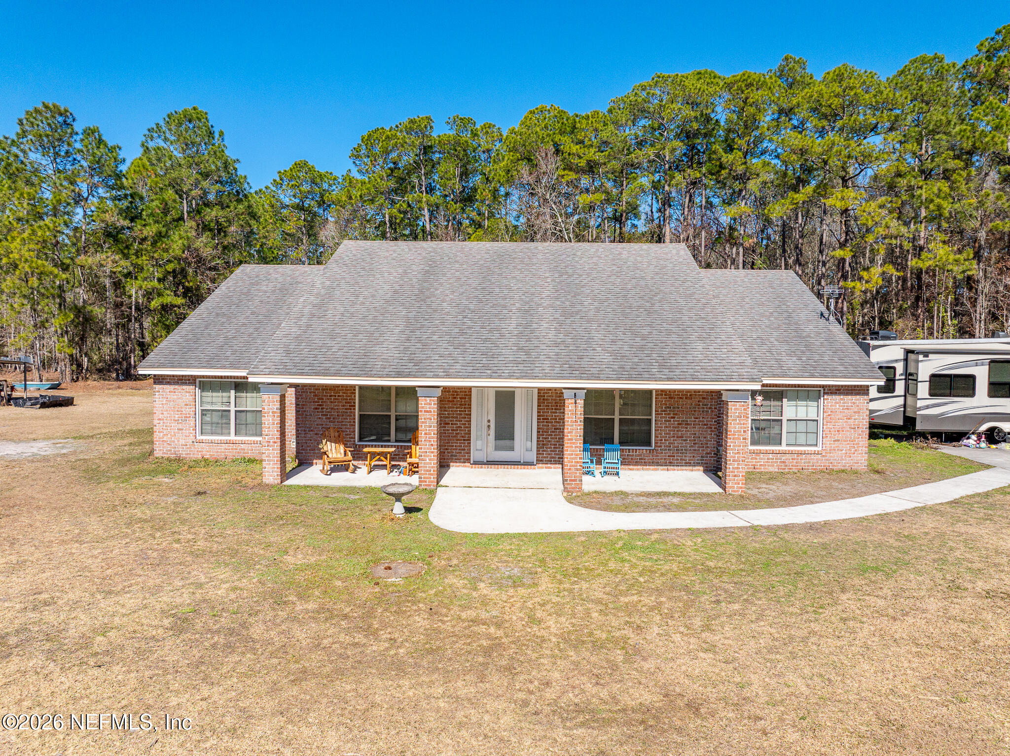 1725 Davidson Farm Road Jacksonville, FL 32218 - Photo 49 of 53 front view of a house with a yard
