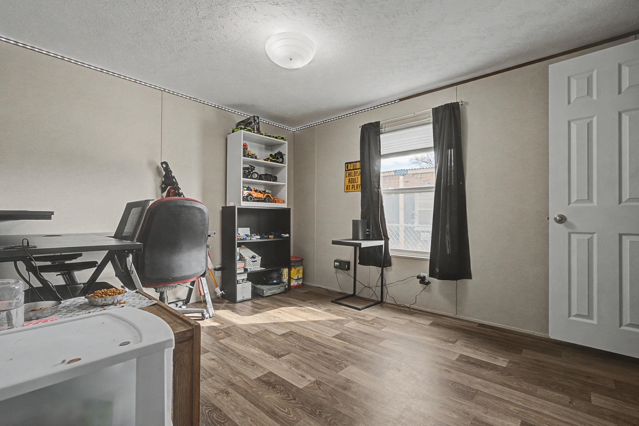 269 Clements Way Fruita, CO 81521 - Photo 13 of 20 a workspace with wooden floor
