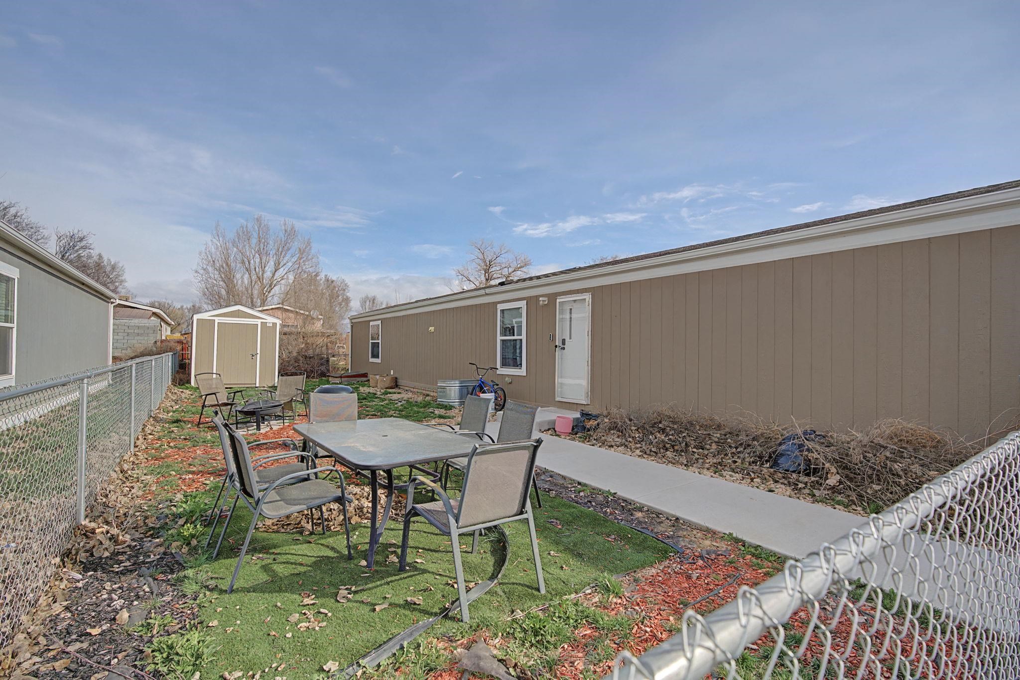 269 Clements Way Fruita, CO 81521 - Photo 2 of 20 a outdoor space with a table and chairs