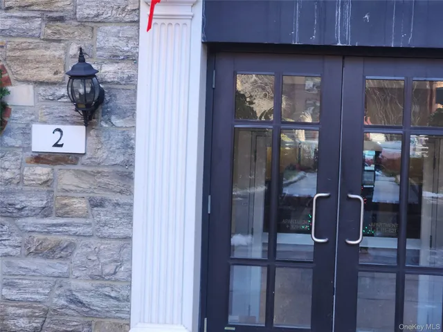 a view of a hallway with closet
