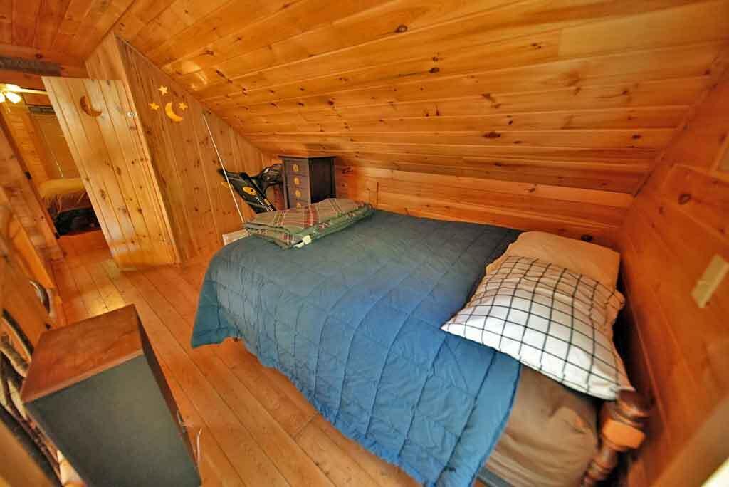 323 Sandy Beach Road Danforth, ME 04424 - Photo 67 of 81 loft-bedroom-maine-lake-cab